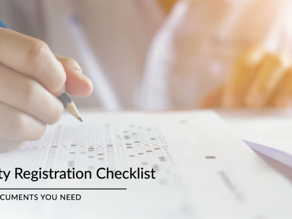 A document checklist graphic with a blue checkmark and property icons on a white background._brandestate.in